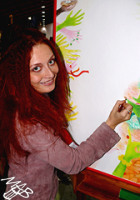 Marie Brozova drawing in public